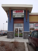 Store front for The Brick Mattress Store